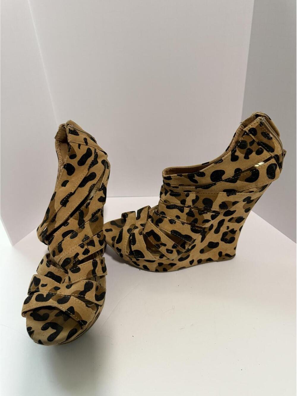 JUSTFAB animal print wedge heels criss-cross